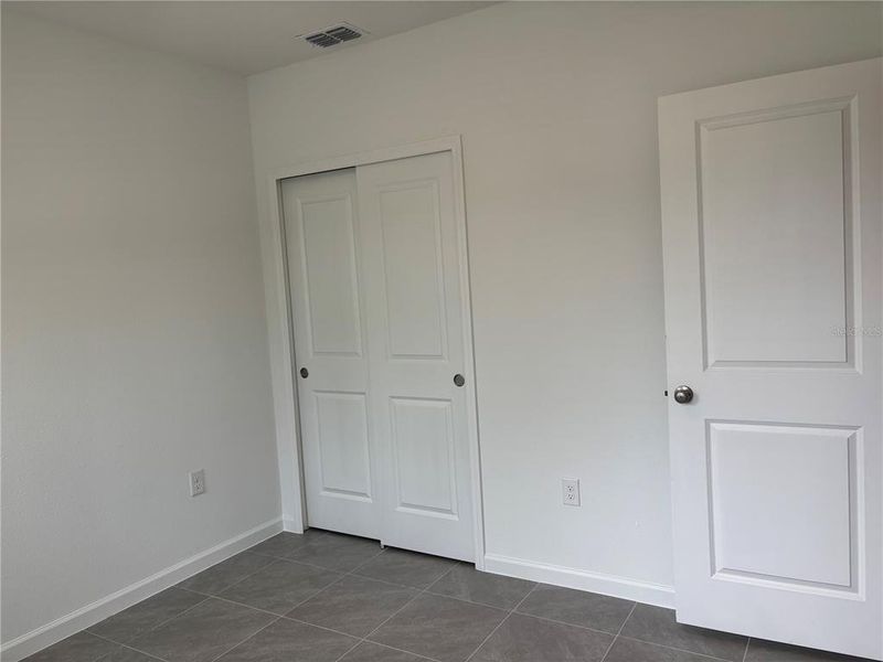 Spacious, unfurnished interior of a new home in Aspire at Palm Coast, Palm Coast (Image 20).
