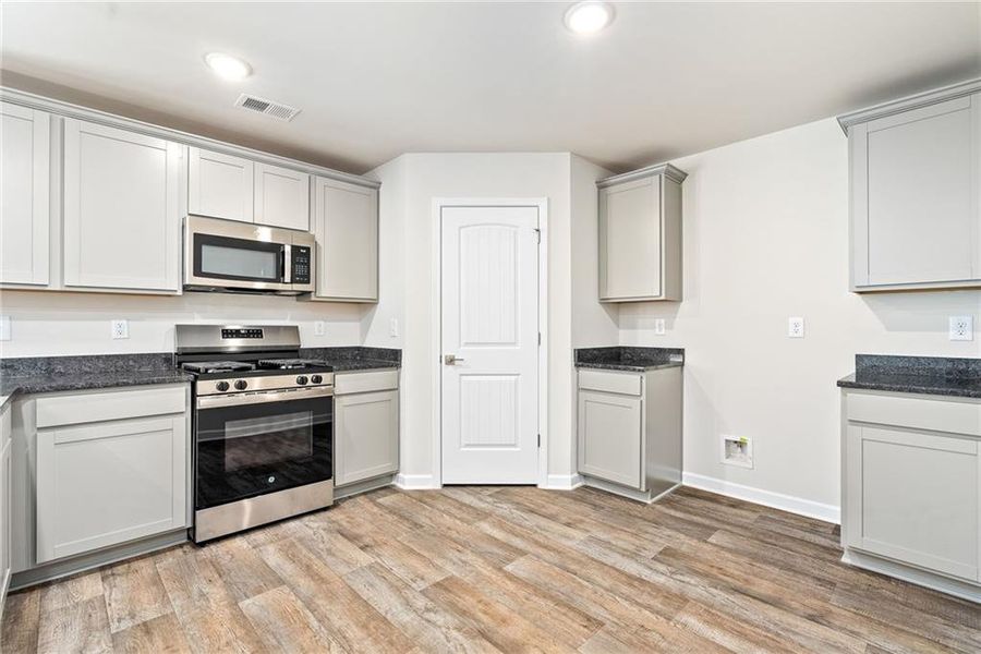 Furnished interior view inside a new home in Crossvine Village, LaGrange (Image 3). Furnished interior view inside a new home in Crossvine Village, LaGrange (Image 3).