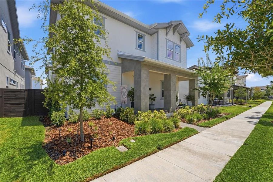 Front exterior of a new home in , Orlando, FL, highlighting curb appeal (Image 28). Front exterior of a new home in , Orlando, FL, highlighting curb appeal (Image 28).