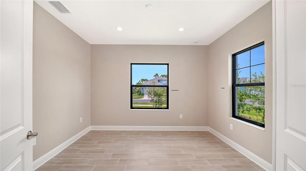 Spacious, unfurnished interior of a new home in Grand Park, Sarasota (Image 34). Spacious, unfurnished interior of a new home in Grand Park, Sarasota (Image 34).