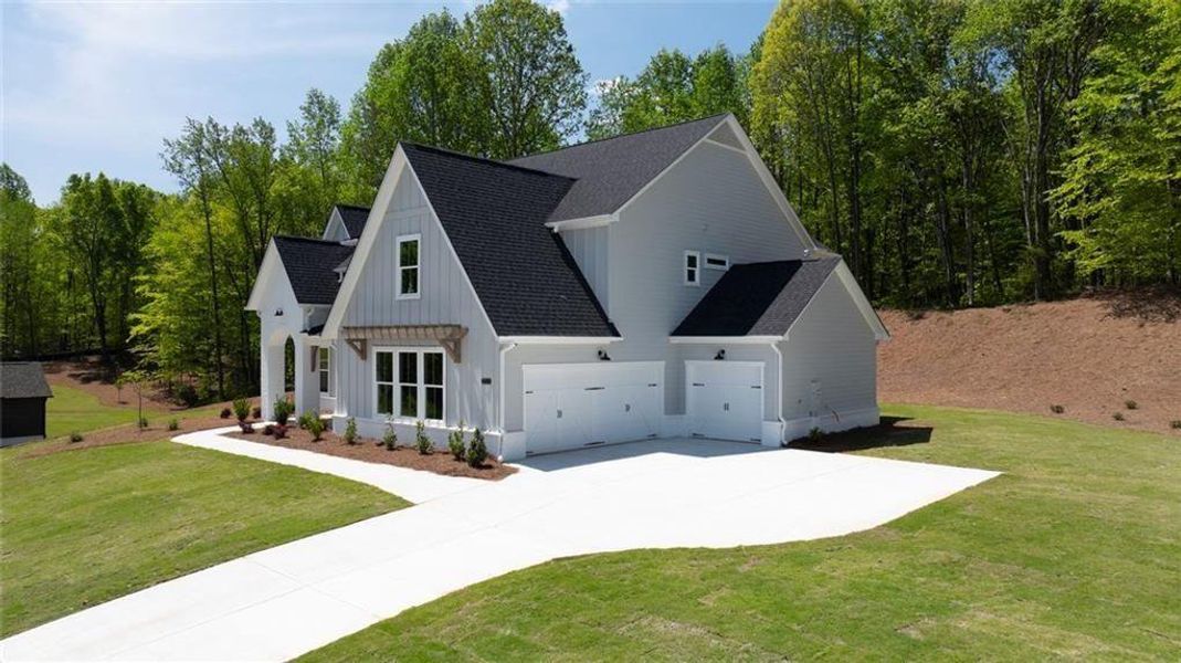 Front exterior of a new home in , Gainesville, GA, highlighting curb appeal (Image 28).