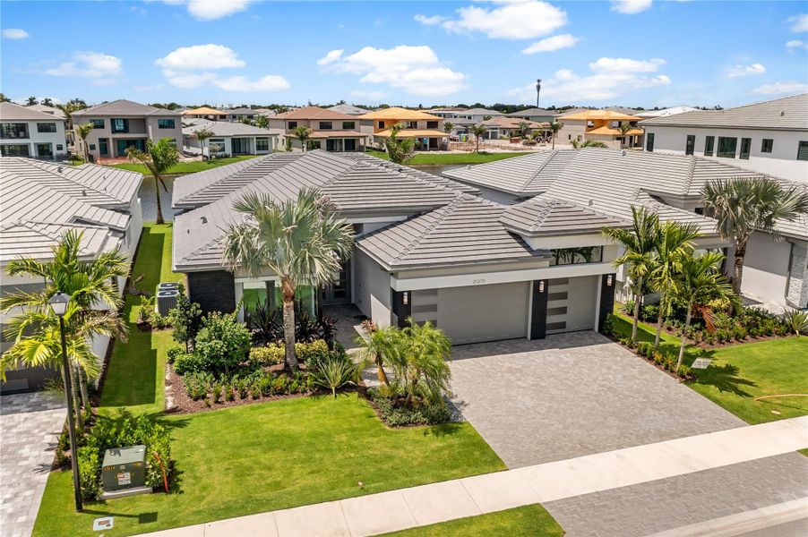 Front exterior of a new home in , Boca Raton, FL, highlighting curb appeal (Image 31). Front exterior of a new home in , Boca Raton, FL, highlighting curb appeal (Image 31).
