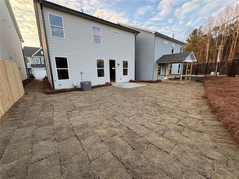 Exterior details and patio area of a home in The Village at Shallowford, Kennesaw (Image 14).