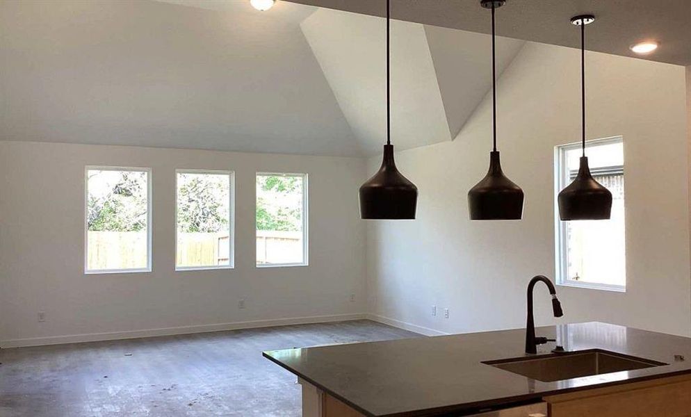 Open Kitchen-Living-Dining Room Construction Progress featuring the Foundry Collection