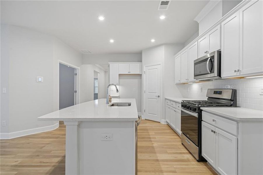 Furnished interior view inside a new home in Bennett Park, Grayson (Image 7).