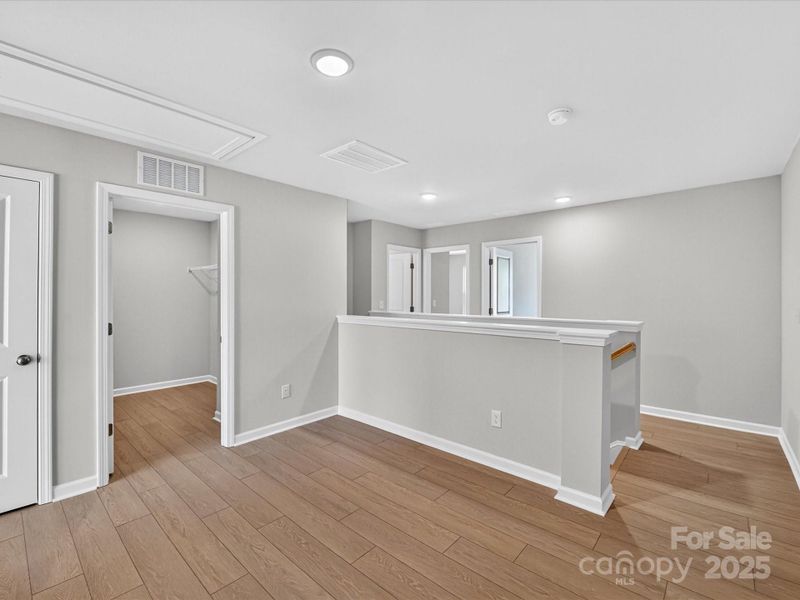 Spacious, unfurnished interior of a new home in North Creek Village - Townhomes, Huntersville (Image 37).