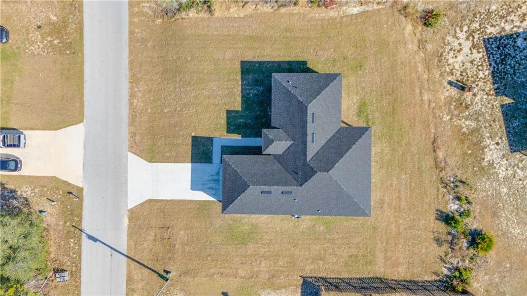 Front exterior of a new home in , Ocala, FL, highlighting curb appeal (Image 13).