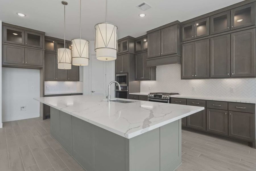 Representative furnished interior of a home built from the Waterford by Chesmar Homes in Meridiana 60's, Manvel (Image 9).