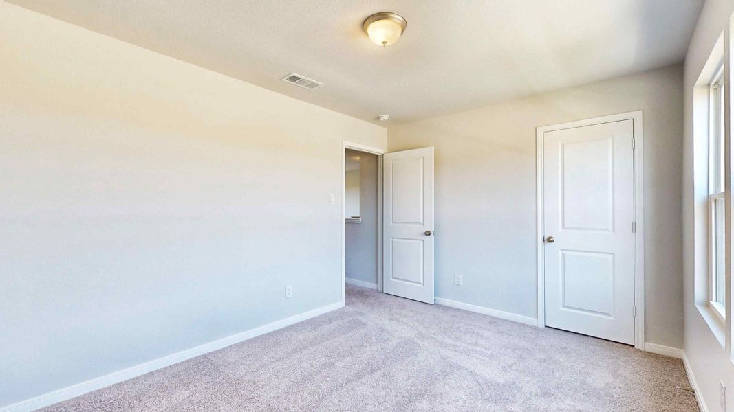 A room with white doors.