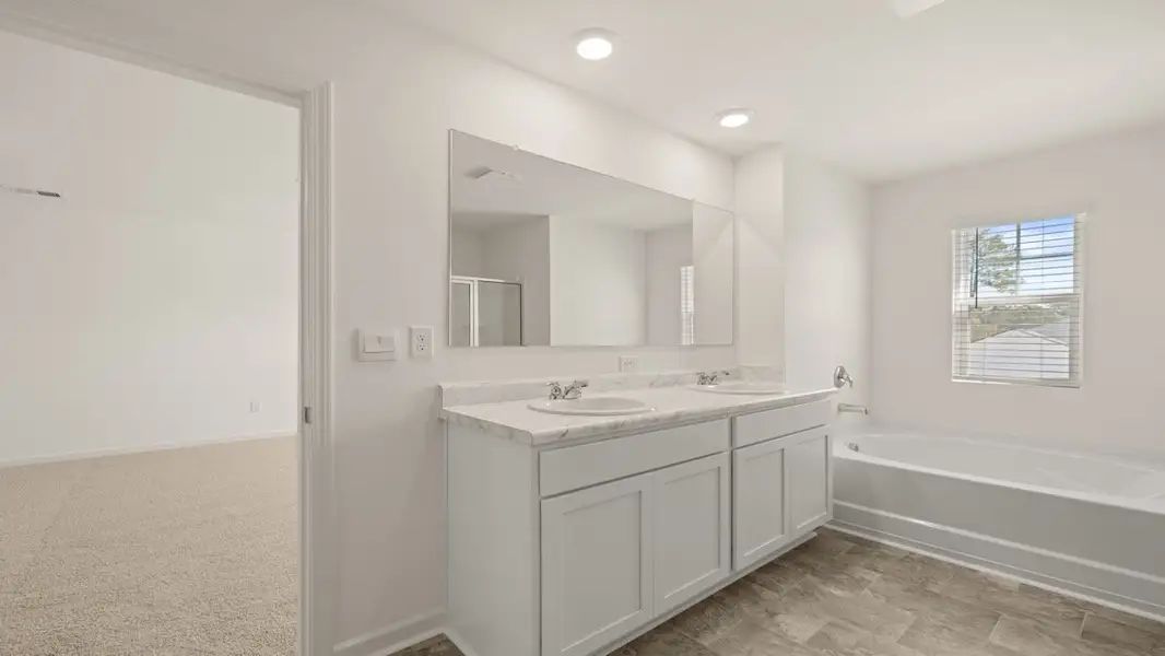 Furnished interior view inside a new home in Champion's Run, Lithonia (Image 9).