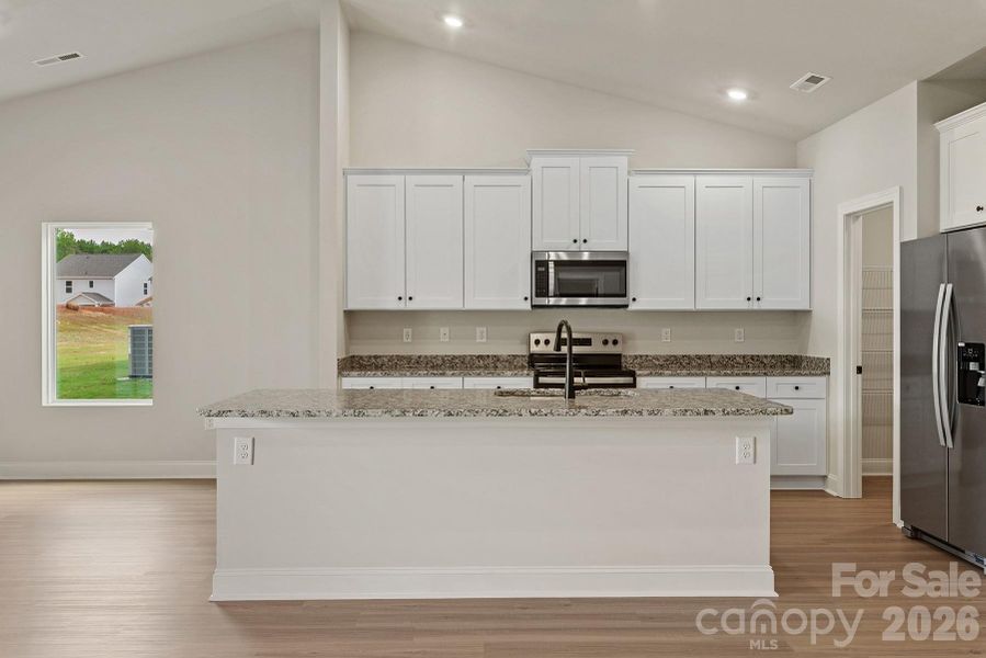 Furnished interior view inside a new home in Ascot Woods, Charlotte (Image 3).