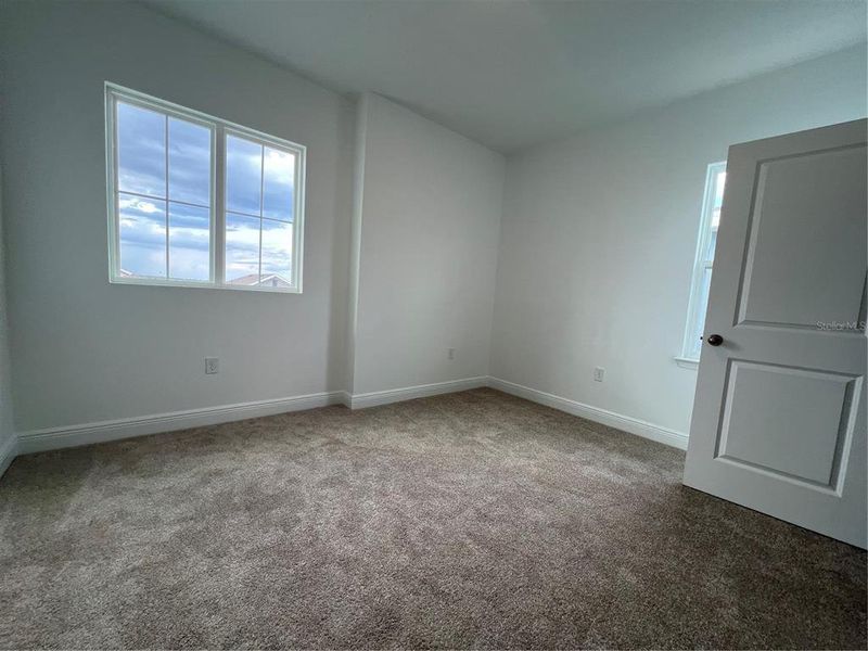 Spacious, unfurnished interior of a new home in Hills of Minneola, Minneola (Image 15).