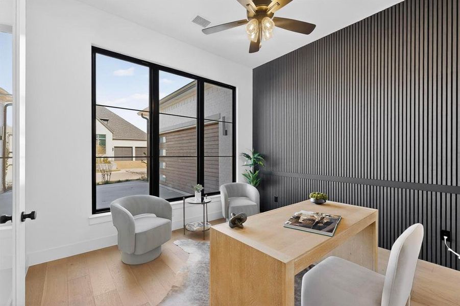 Immediately off entry the office has dramatic glass double doors and feature wall.