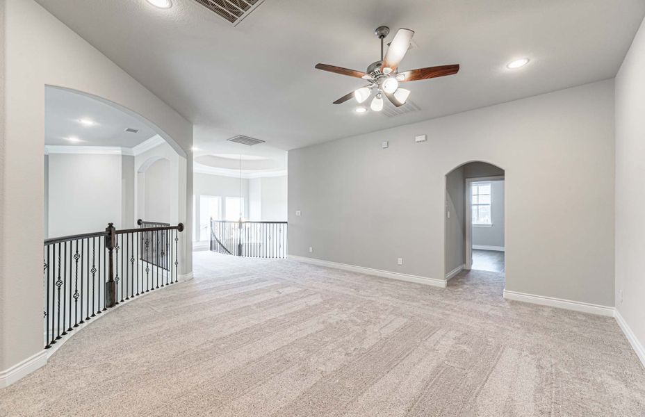 Representative unfurnished interior of a home built from the 4195 by Ravenna Homes in Artavia 70′, Conroe (Image 60). Representative unfurnished interior of a home built from the 4195 by Ravenna Homes in Artavia 70′, Conroe (Image 60).