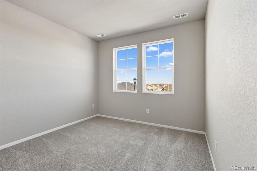 Spacious, unfurnished interior of a new home in Talon Pointe, Thornton (Image 29).