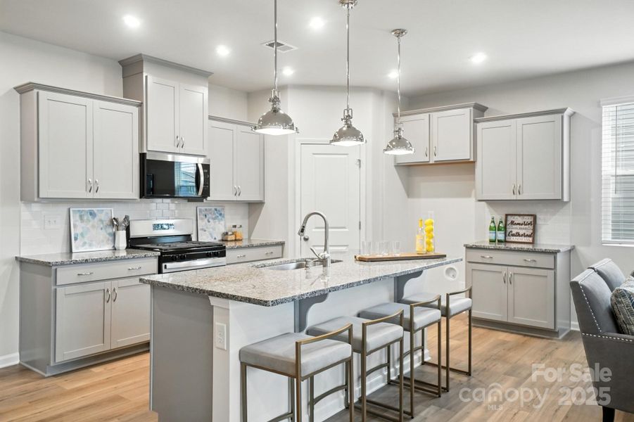 Furnished interior view inside a new home in Waxhaw Landing, Monroe (Image 13).