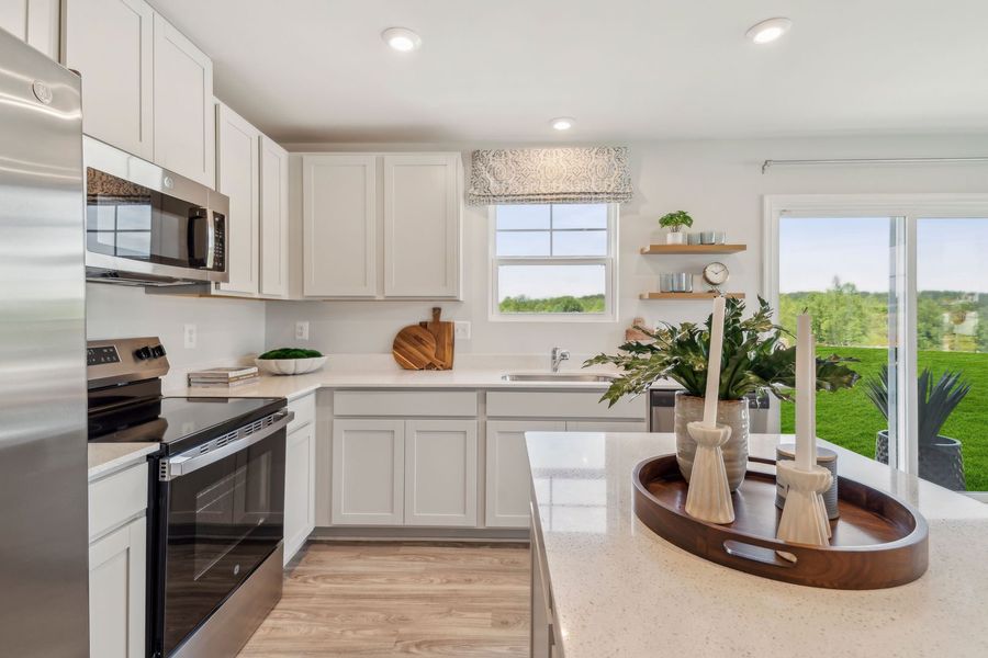 Representative furnished interior of a home built from the The Rutledge by Stanley Martin Homes in Essence at Trinity Townhomes, Columbia (Image 25).