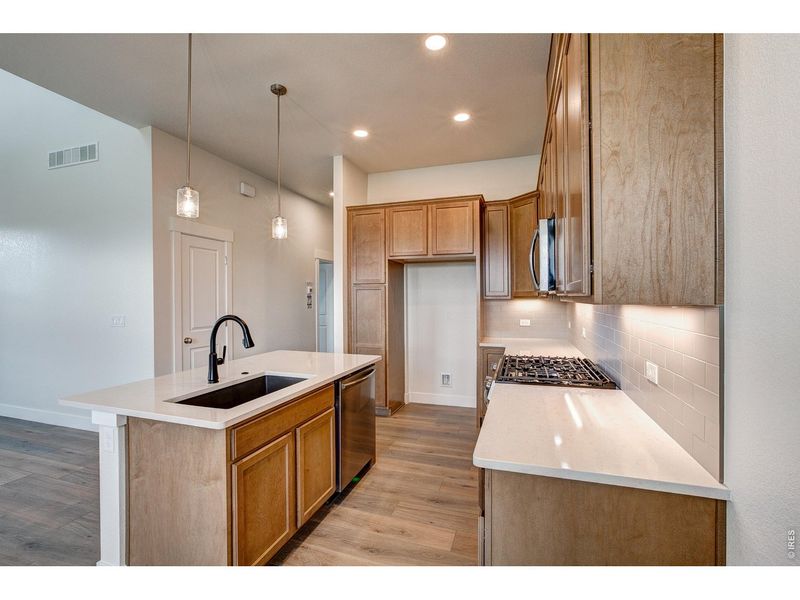 Furnished interior view inside a new home in The Lakes at Centerra - The Shores, Loveland (Image 7).