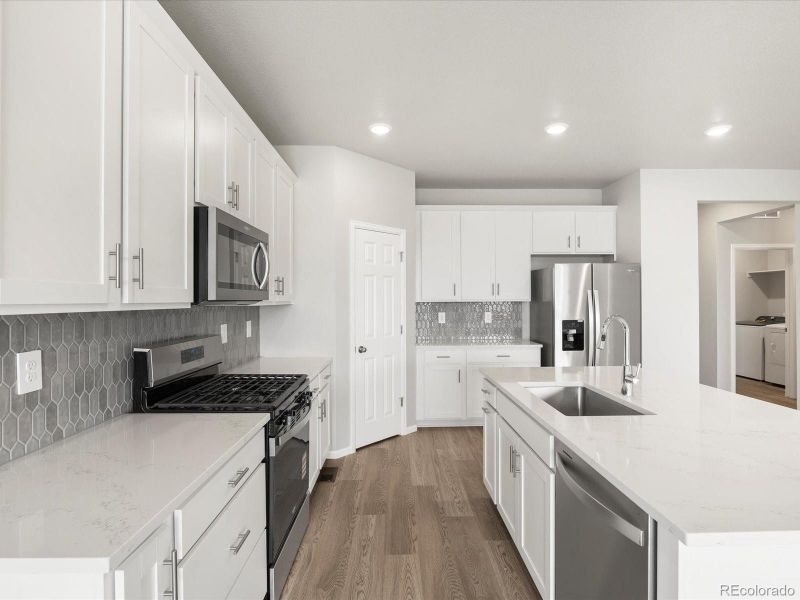Furnished interior view inside a new home in Buffalo Highlands: The Canyon Collection, Commerce City (Image 16).