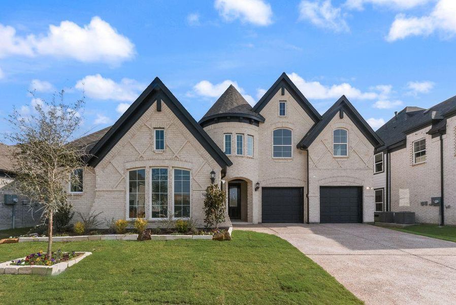 Front exterior of a new home in Cedar Ridge Estates, Grand Prairie, TX, highlighting curb appeal (Image 1). Front exterior of a new home in Cedar Ridge Estates, Grand Prairie, TX, highlighting curb appeal (Image 1).