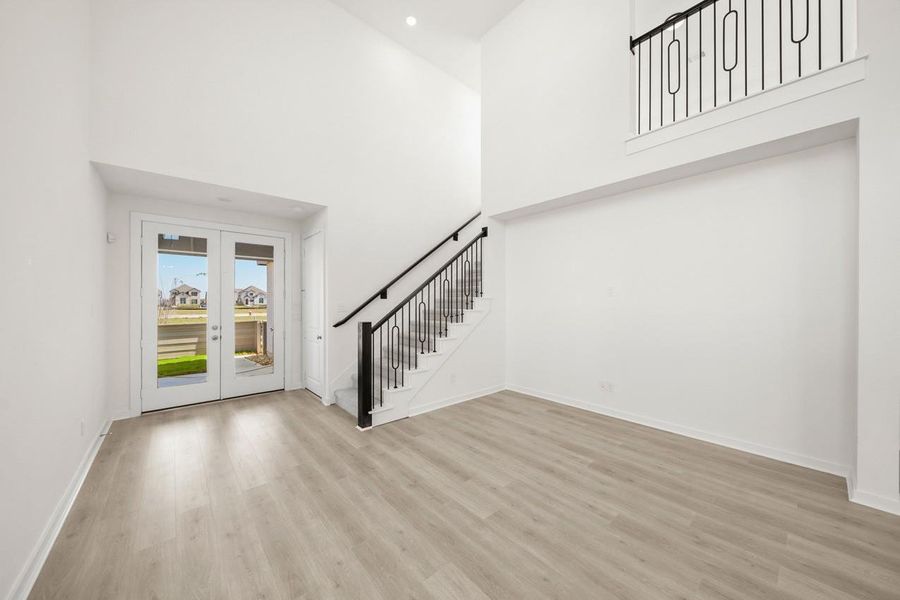 Family room with a niche that would look SO good with accent paint, tile or built ins!