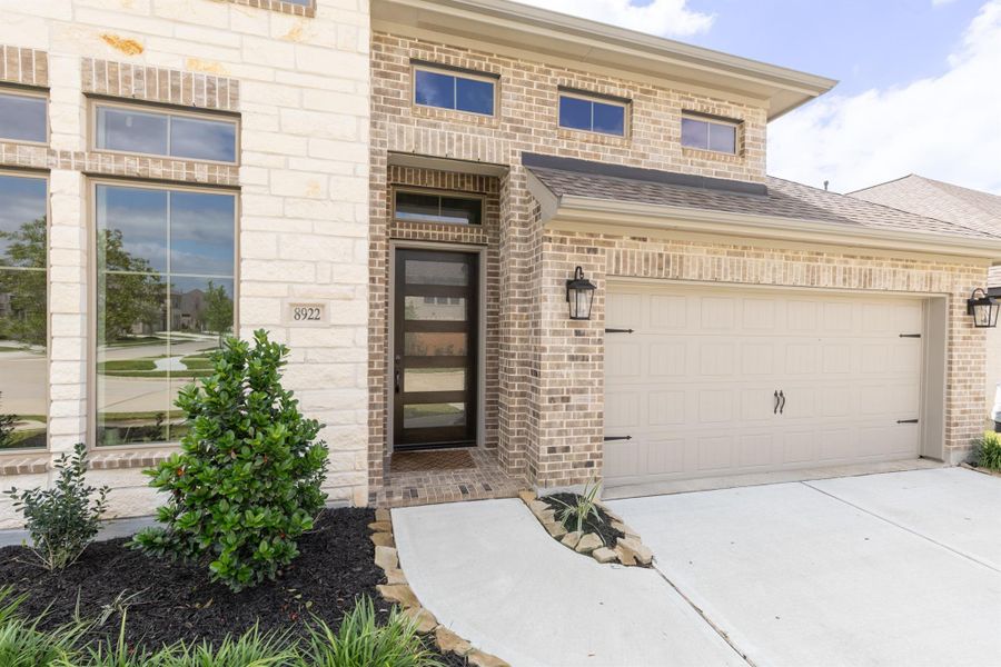 Exterior details and patio area of a home in Marvida, Cypress (Image 3).