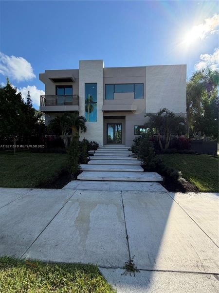 Front exterior of a new home in , Hollywood, FL, highlighting curb appeal (Image 28).