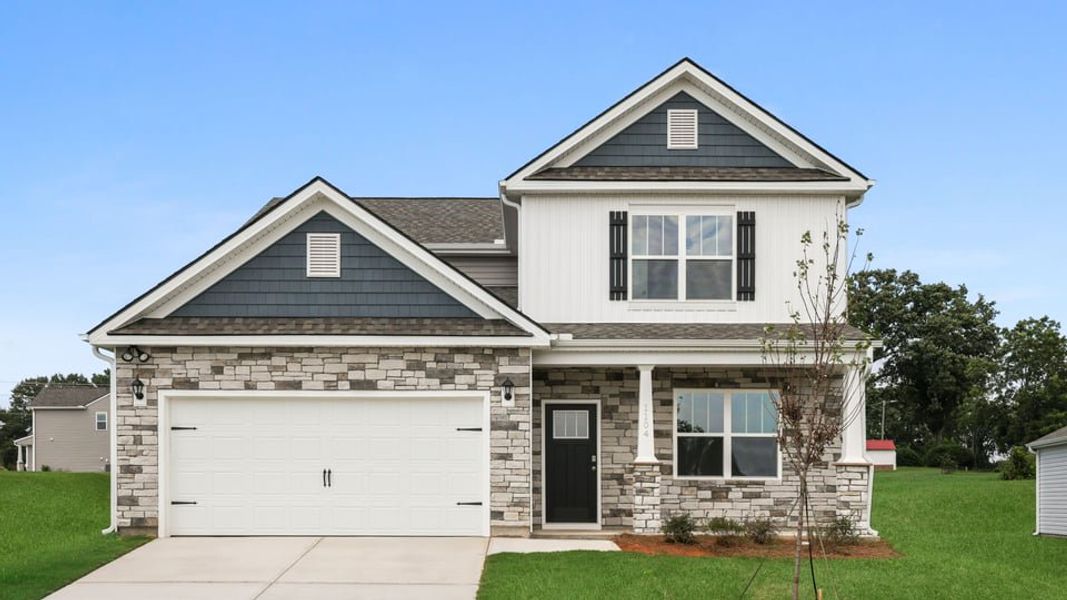 Front exterior of a new home in Benjamin's Grove, Woodruff, SC, highlighting curb appeal (Image 1). Front exterior of a new home in Benjamin's Grove, Woodruff, SC, highlighting curb appeal (Image 1).