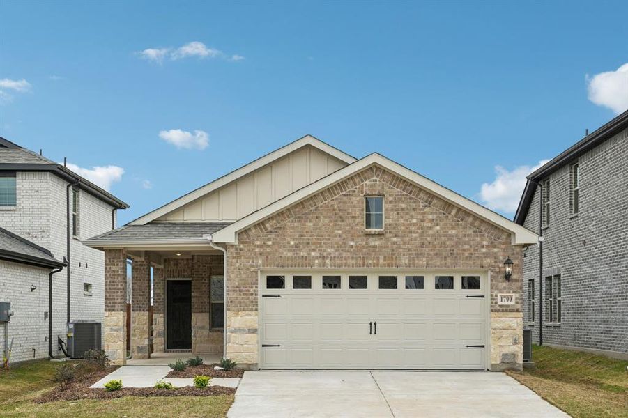 Front exterior of a new home in Parks at Foster Crossing - Spring Series, Anna, TX, highlighting curb appeal (Image 24). Front exterior of a new home in Parks at Foster Crossing - Spring Series, Anna, TX, highlighting curb appeal (Image 24).