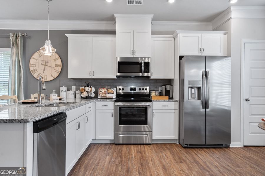 Furnished interior view inside a new home in Crescent Towns, Riverdale (Image 14).