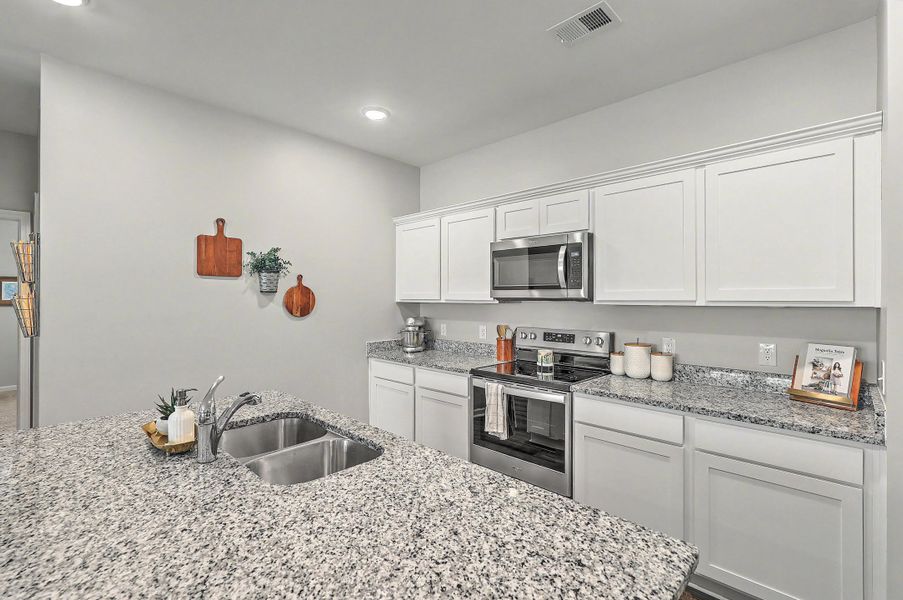 Furnished interior view inside a new home in Watson Hill, Summerville (Image 5).