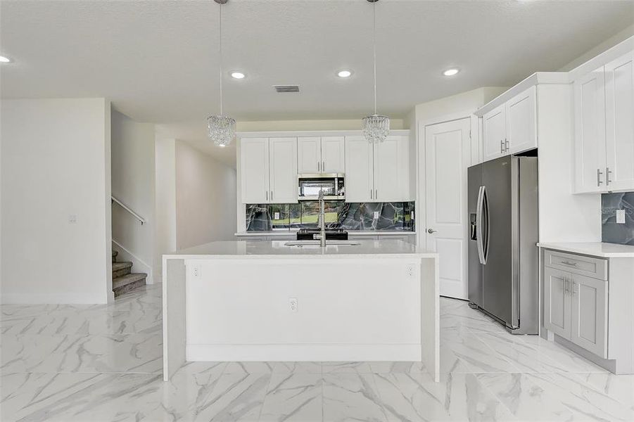 Furnished interior view inside a new home in , Apopka (Image 6).
