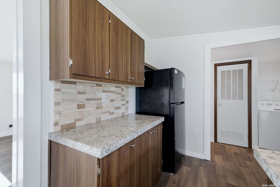 Furnished interior view inside a new home in , Atascosa (Image 10).