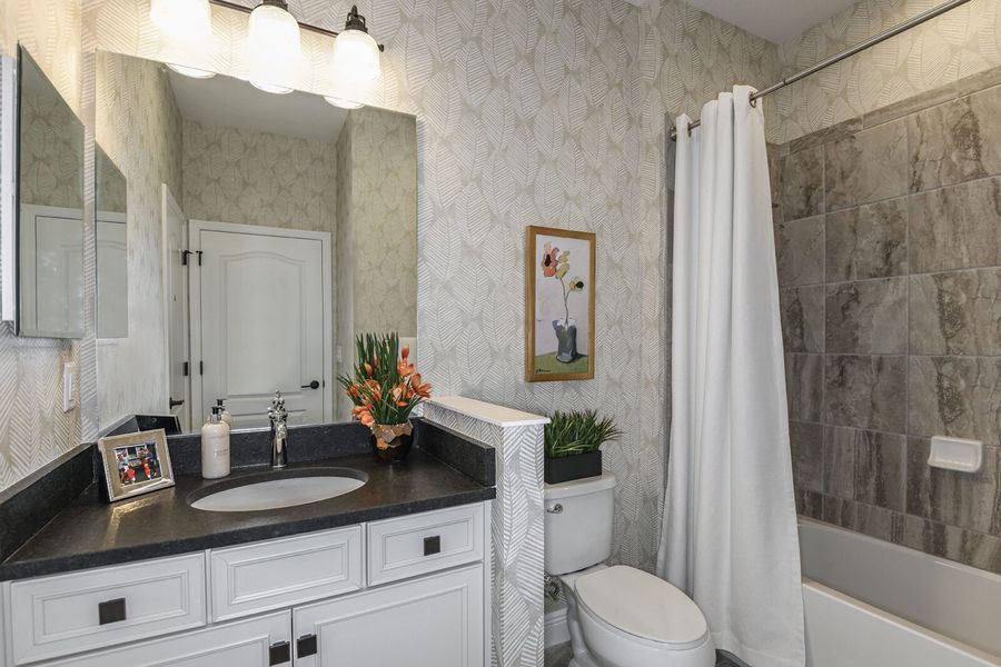 Representative furnished interior of a home built from the Tidewater 2B by Neal Communities in Vicenza, Venice (Image 13).