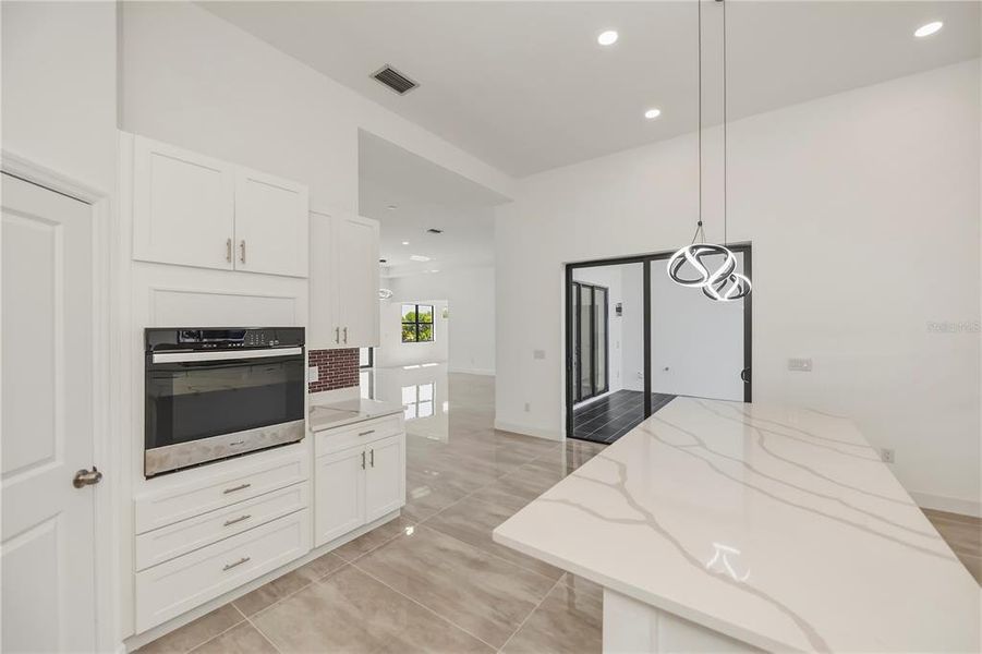 Furnished interior view inside a new home in , Port Charlotte (Image 12).