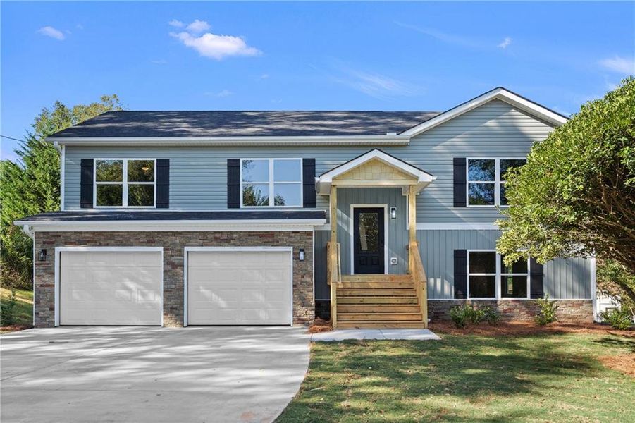 Front exterior of a new home in , Cornelia, GA, highlighting curb appeal (Image 1). Front exterior of a new home in , Cornelia, GA, highlighting curb appeal (Image 1).