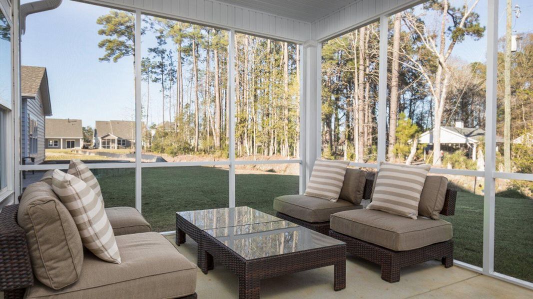 Exterior details and patio area of a home in Sweetgrass at Summers Corner, Summerville (Image 2). Exterior details and patio area of a home in Sweetgrass at Summers Corner, Summerville (Image 2).