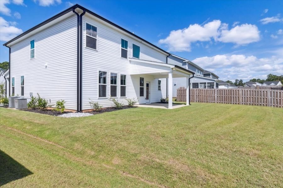 Front exterior of a new home in Windsor, North Augusta, SC, highlighting curb appeal (Image 19). Front exterior of a new home in Windsor, North Augusta, SC, highlighting curb appeal (Image 19).