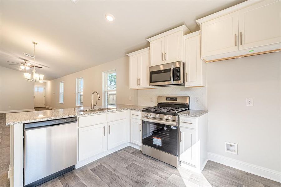 Furnished interior view inside a new home in Stonebrooke, Conroe (Image 5).
