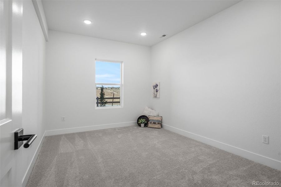 Spacious, unfurnished interior of a new home in Revel Crossing at Wolf Ranch - The Panorama Collection, Colorado Springs (Image 35).
