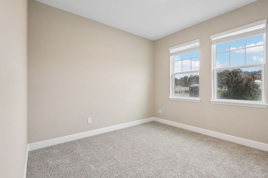Spacious, unfurnished interior of a new home in Legends Preserve - Signature Series, Daytona Beach (Image 16).