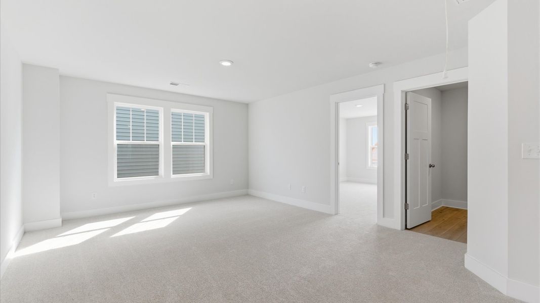 Superior loft space with soft carpet, ideal for work, relaxation, or entertainment located in Gray Court, SC