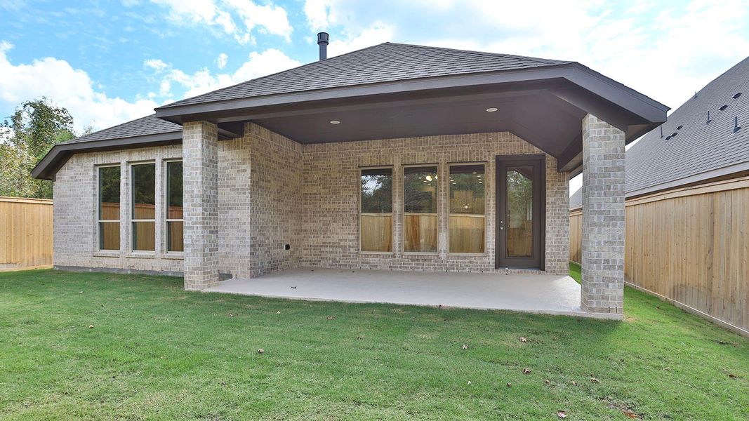 Exterior details and patio area of a home in Kresston 50', Magnolia (Image 2). Exterior details and patio area of a home in Kresston 50', Magnolia (Image 2).