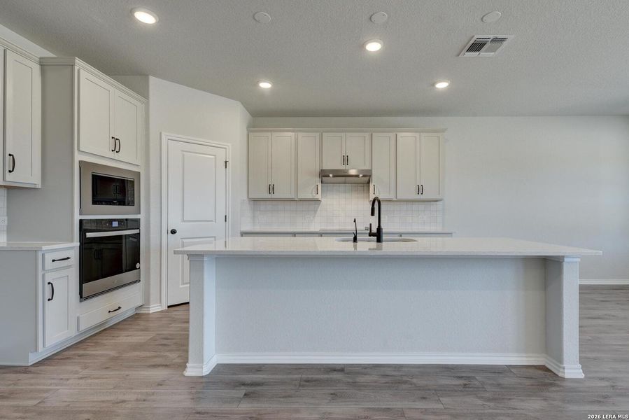 Furnished interior view inside a new home in Hennersby Hollow, San Antonio (Image 11).