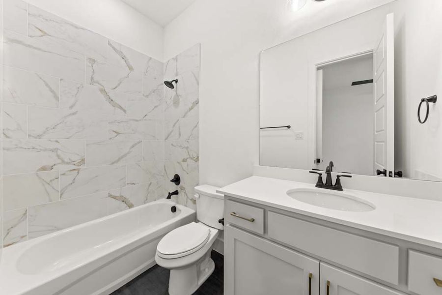 Representative furnished interior of a home built from the 5022 by Tradition Homes in Lakewood at Brookhollow – 60′ Lots, Prosper (Image 7).