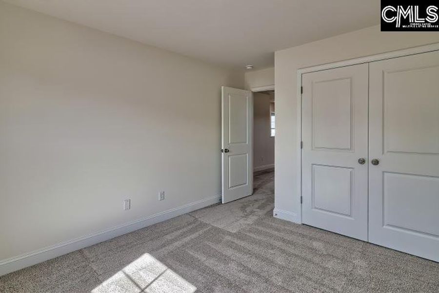 Spacious, unfurnished interior of a new home in Cottages at Roofs Pond, West Columbia (Image 40).
