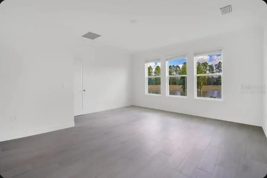 Spacious, unfurnished interior of a new home in Harvest at Ovation, Winter Garden (Image 9). Spacious, unfurnished interior of a new home in Harvest at Ovation, Winter Garden (Image 9).