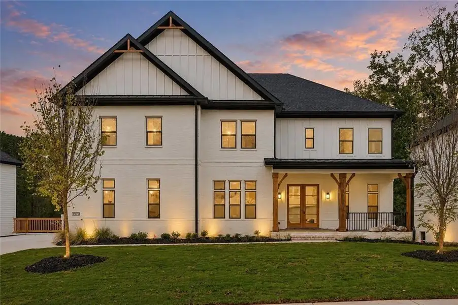 Front exterior of a new home in , Cumming, GA, highlighting curb appeal (Image 1). Front exterior of a new home in , Cumming, GA, highlighting curb appeal (Image 1).