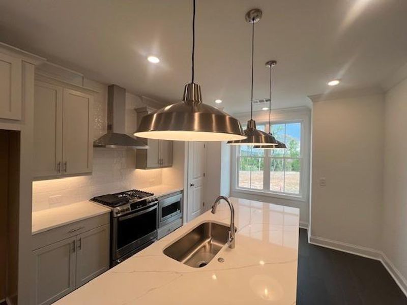 Furnished interior view inside a new home in Palisades Townhomes, Cumming (Image 5). Furnished interior view inside a new home in Palisades Townhomes, Cumming (Image 5).