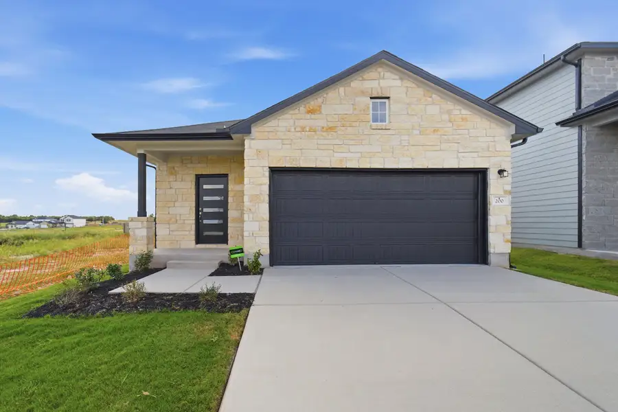 Representative exterior photo of a completed home built from the Hazel by CastleRock Communities in Katzer Ranch, Converse, TX (Image 19).